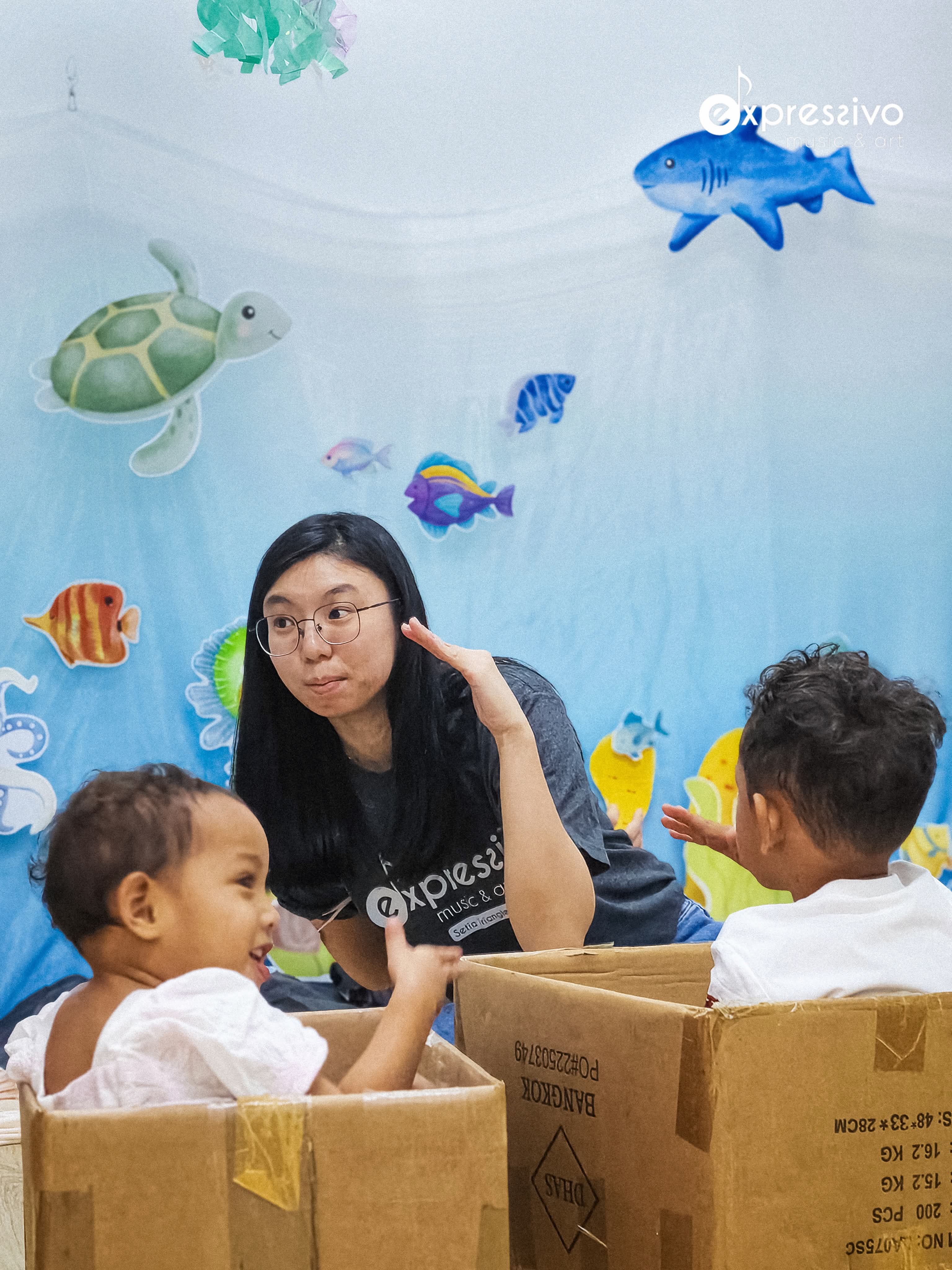Teacher guiding children through imaginative musical play