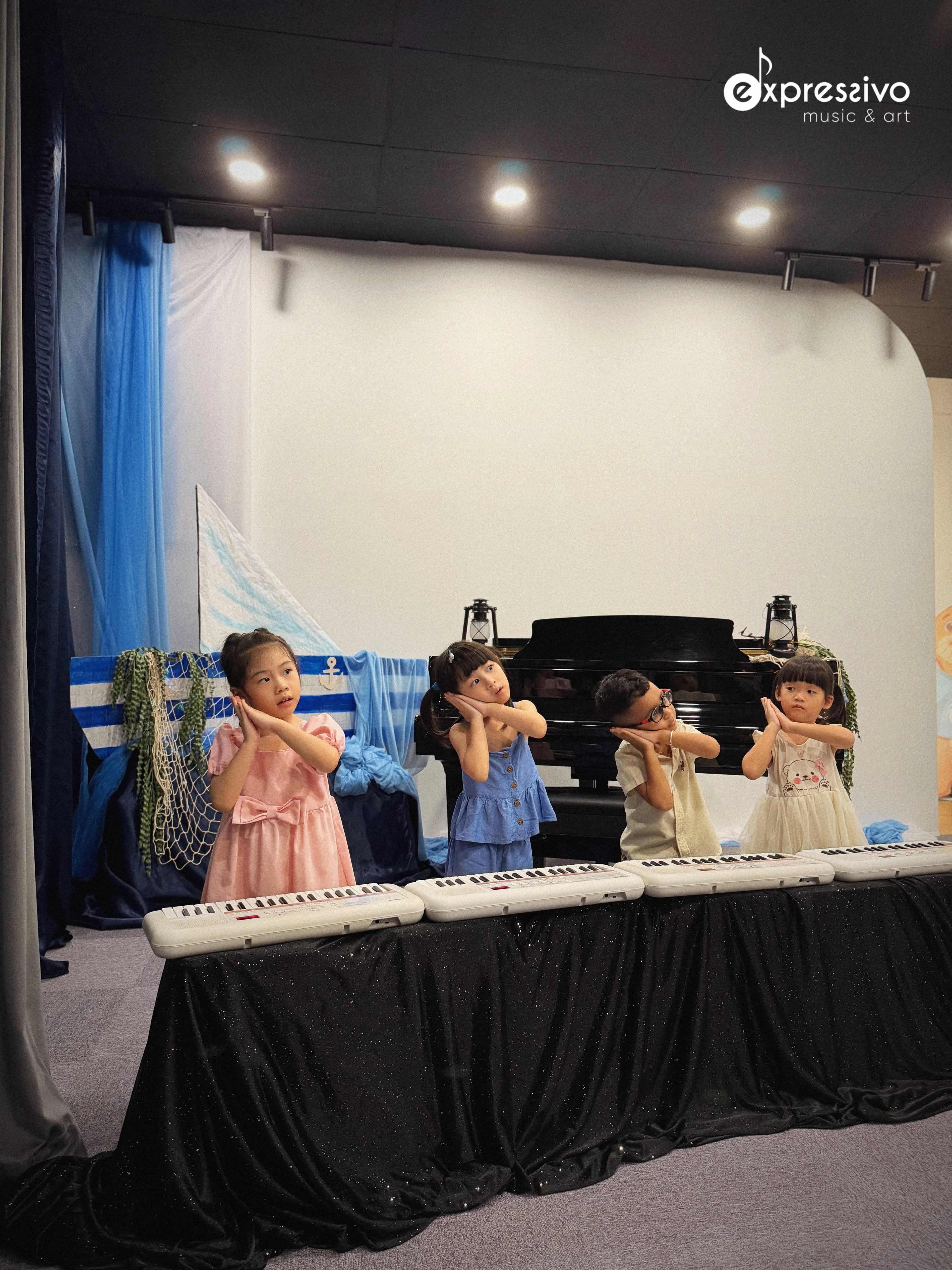 Young musicians performing together on keyboards