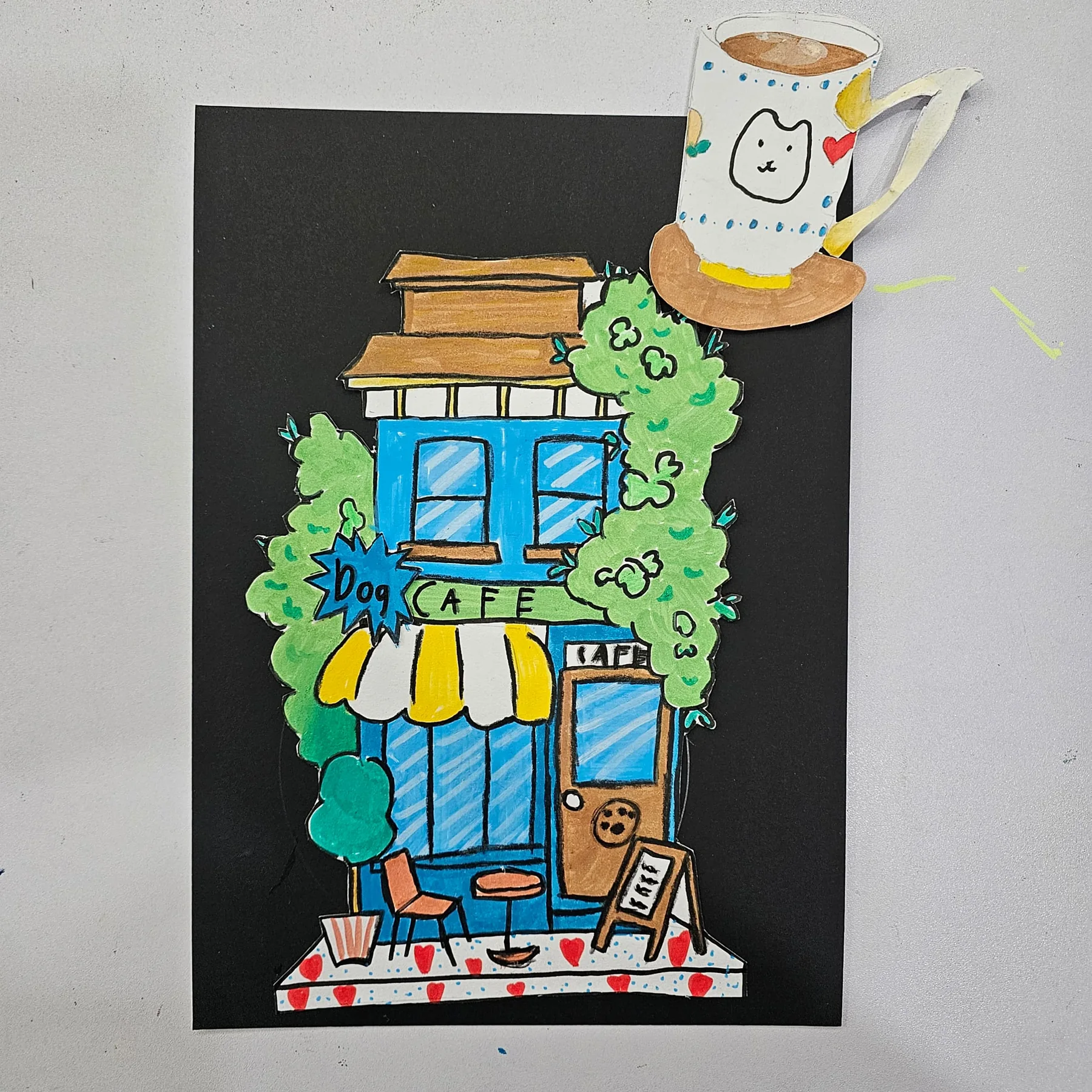 Colourful student-made café artwork from an Expressivo art class