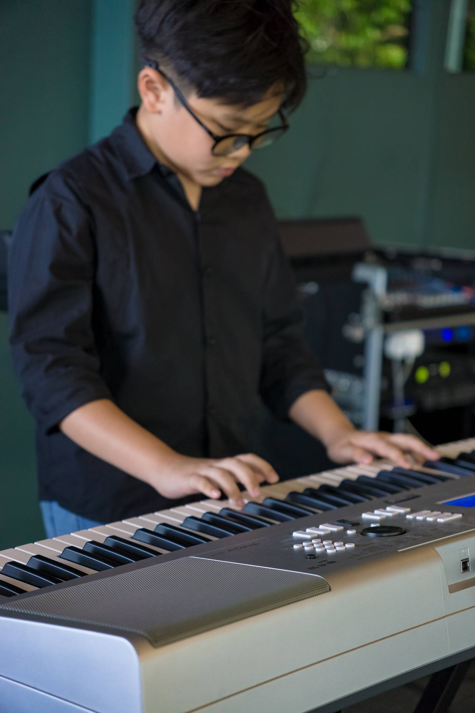 Student performing on keyboard at Rocca Bay
